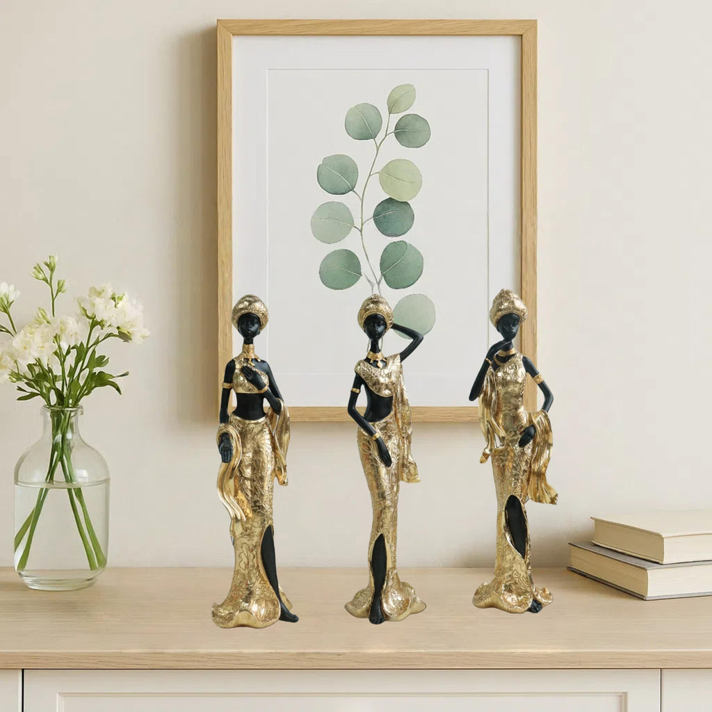Set of 3 Resin African Woman Statues – Elegant Tribal Figurines in Gold Dresses, Afrocentric Home Decor Sculptures for Living Room, Bookshelf, Gift