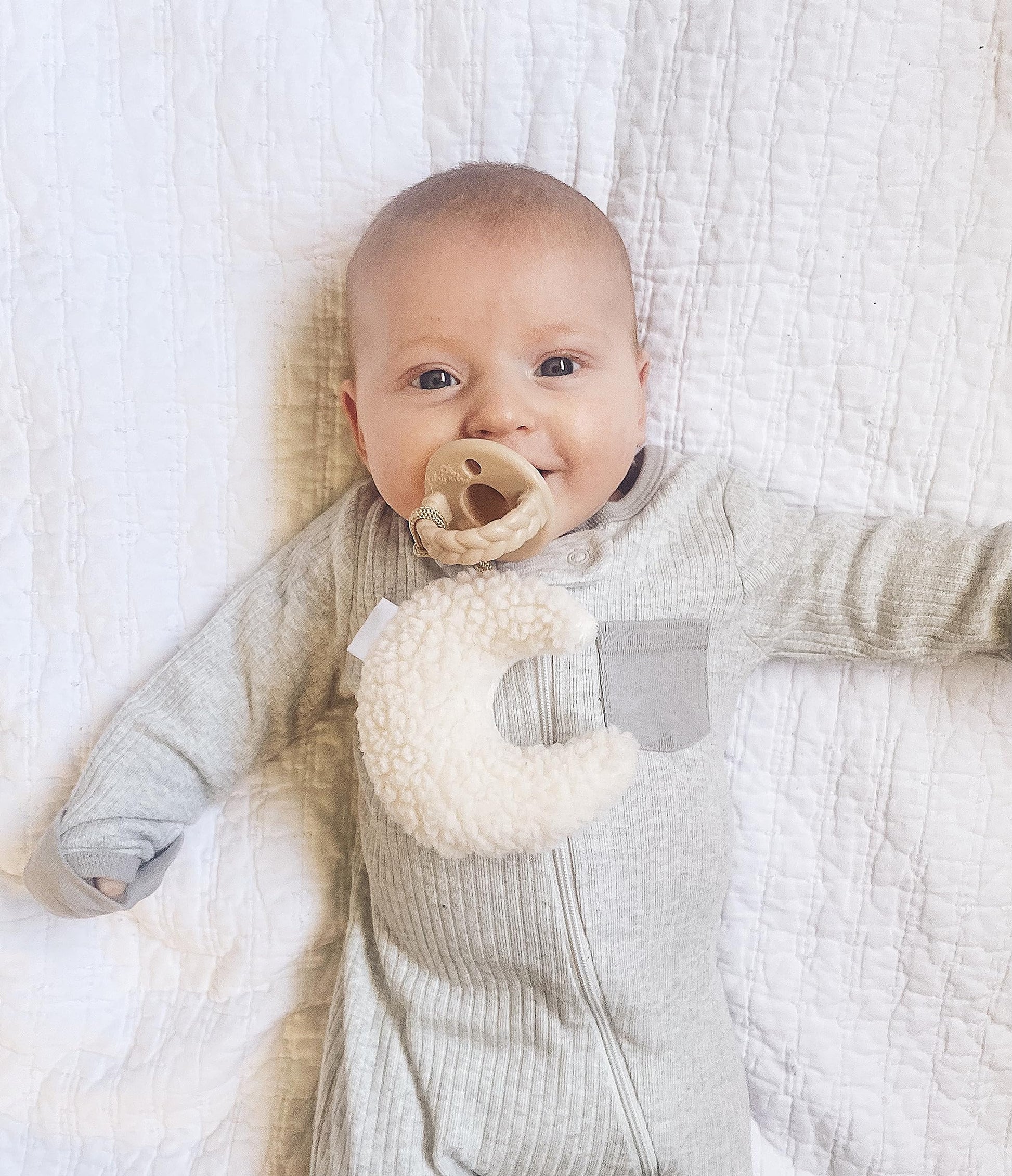 Itzy Ritzy Pacifier and Lovey Set; Detachable Plush Moon and Coordinating Toast Silicone Pacifier; Ideal for Ages 0 Months and Up, Moon